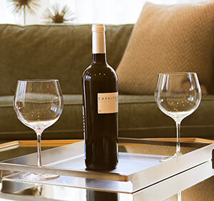 wine glasses and bottle on a table