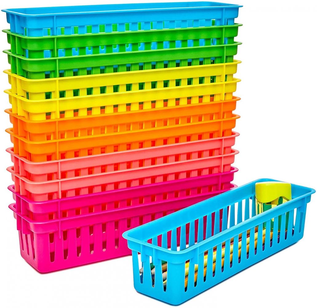 Colorful pen, pencil, and crayon trays for kids.