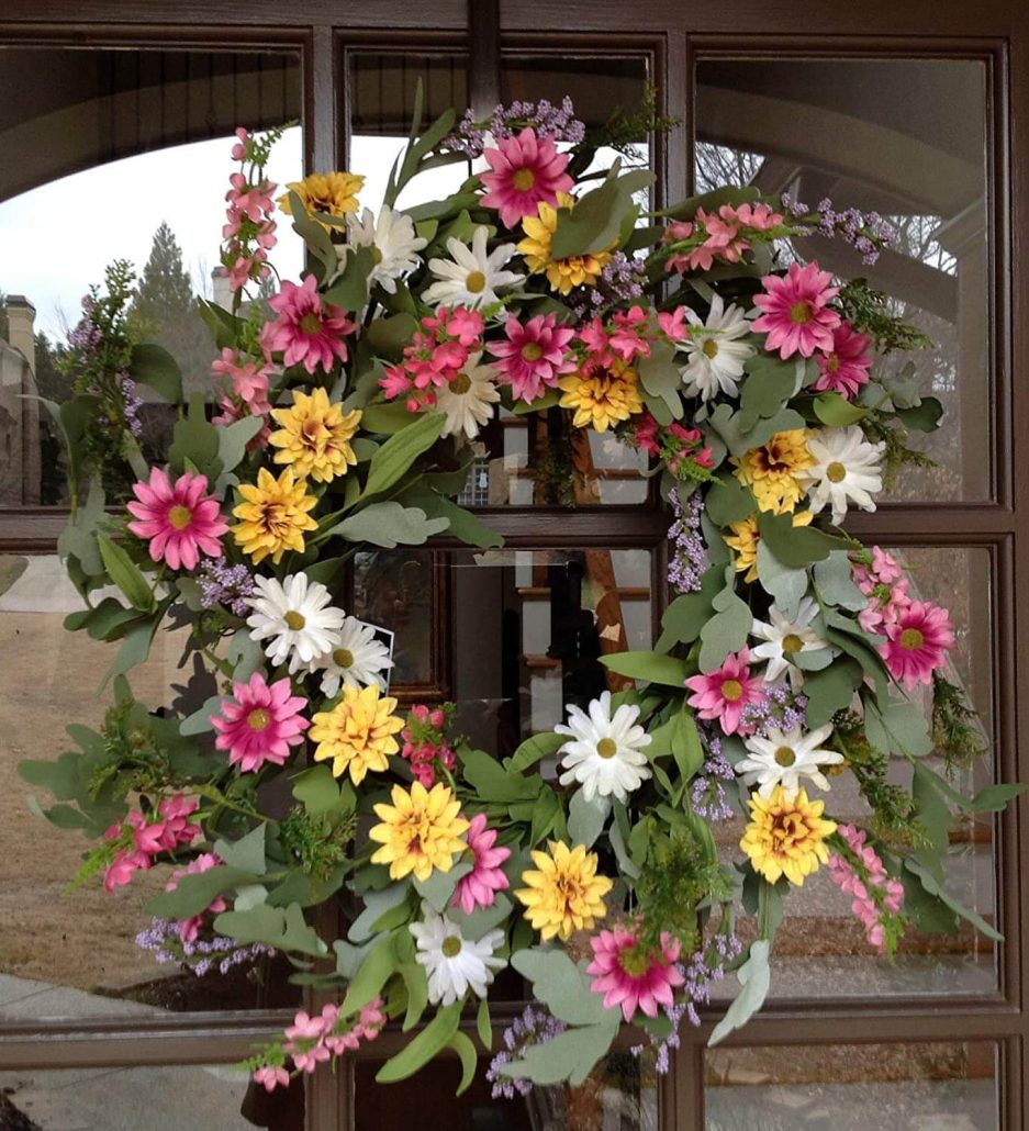 Handmade easter wreath with silk wildflowers.